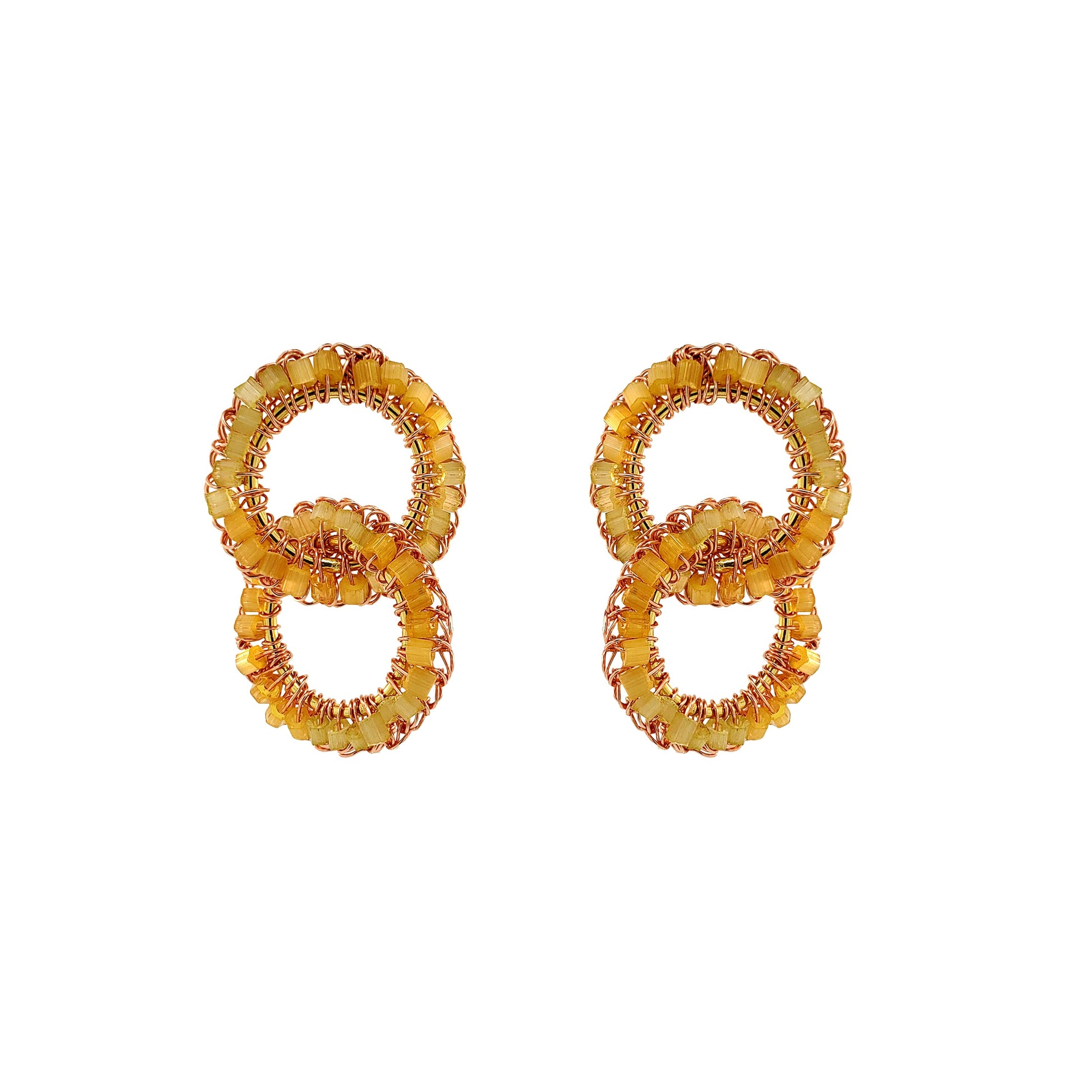 Pair of gold hoop earrings on a white background