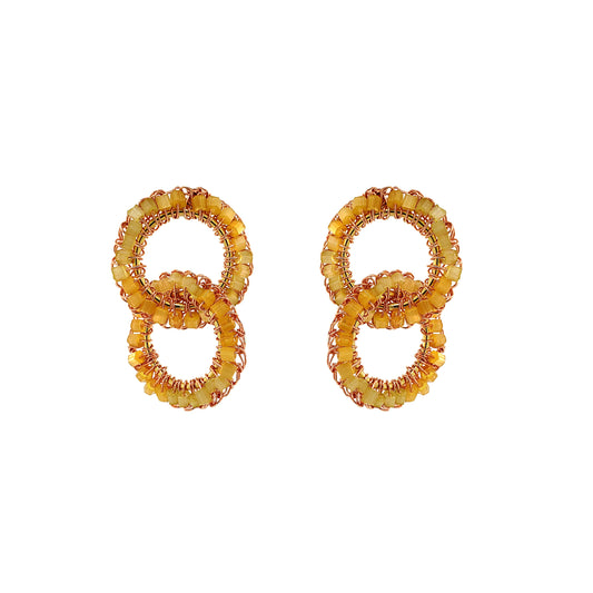 Pair of gold hoop earrings on a white background