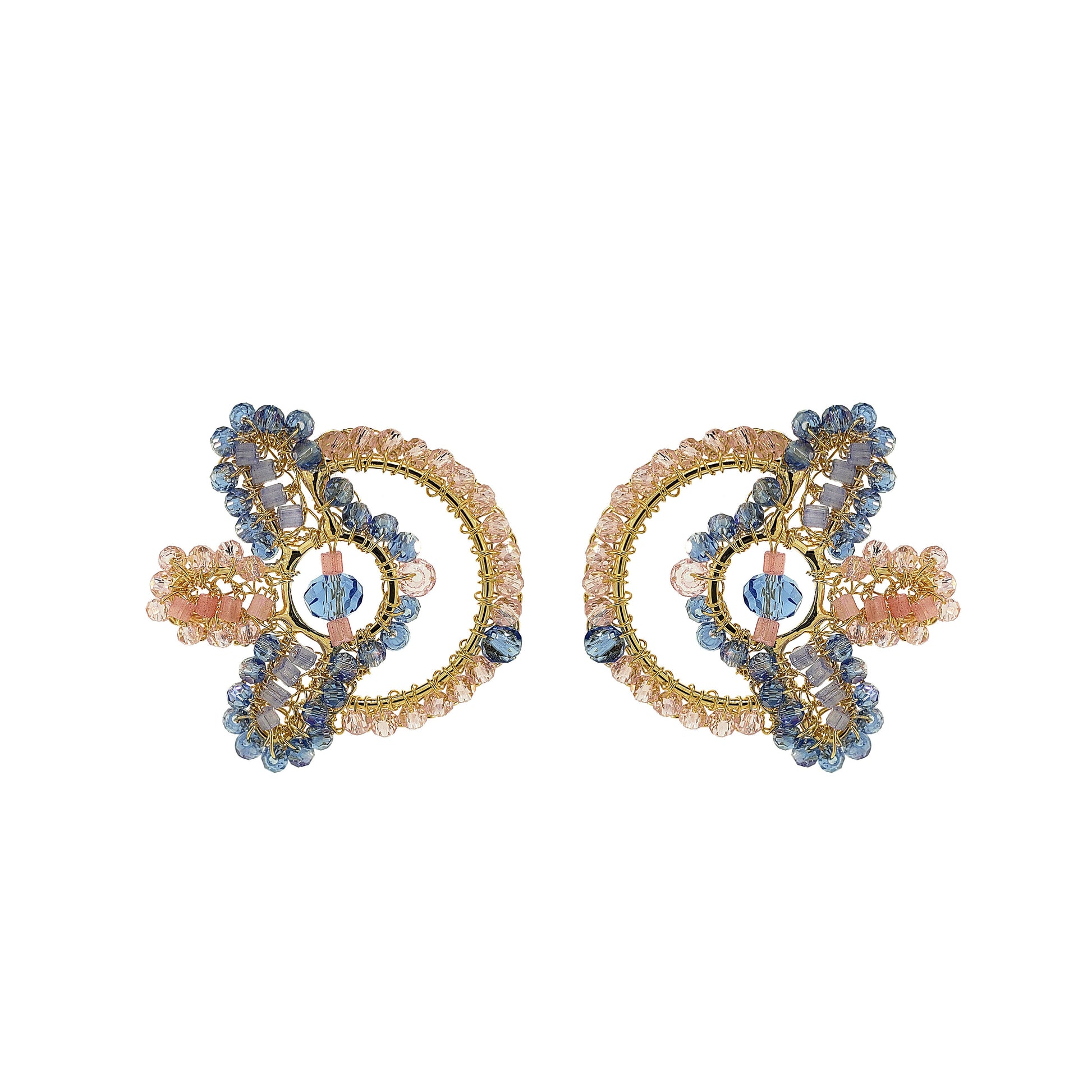 Pair of decorative earrings with gold and blue elements on a white background