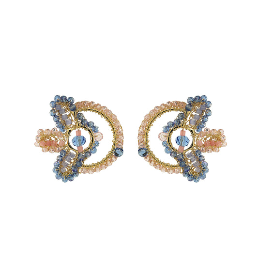 Pair of decorative earrings with gold and blue elements on a white background