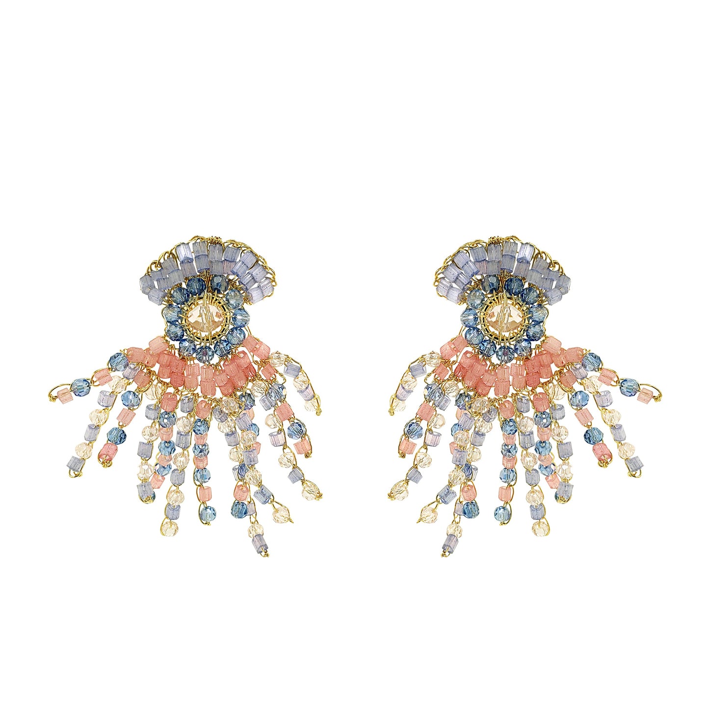 Pair of decorative earrings with floral and organic design and beads on a white background