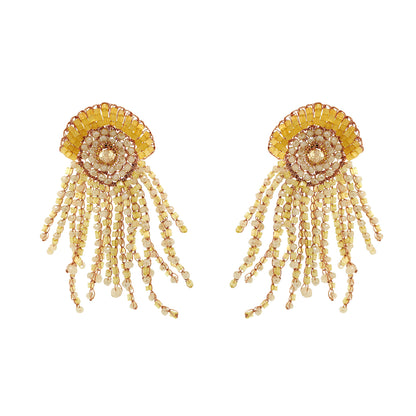 Pair of gold beaded earrings on a white background