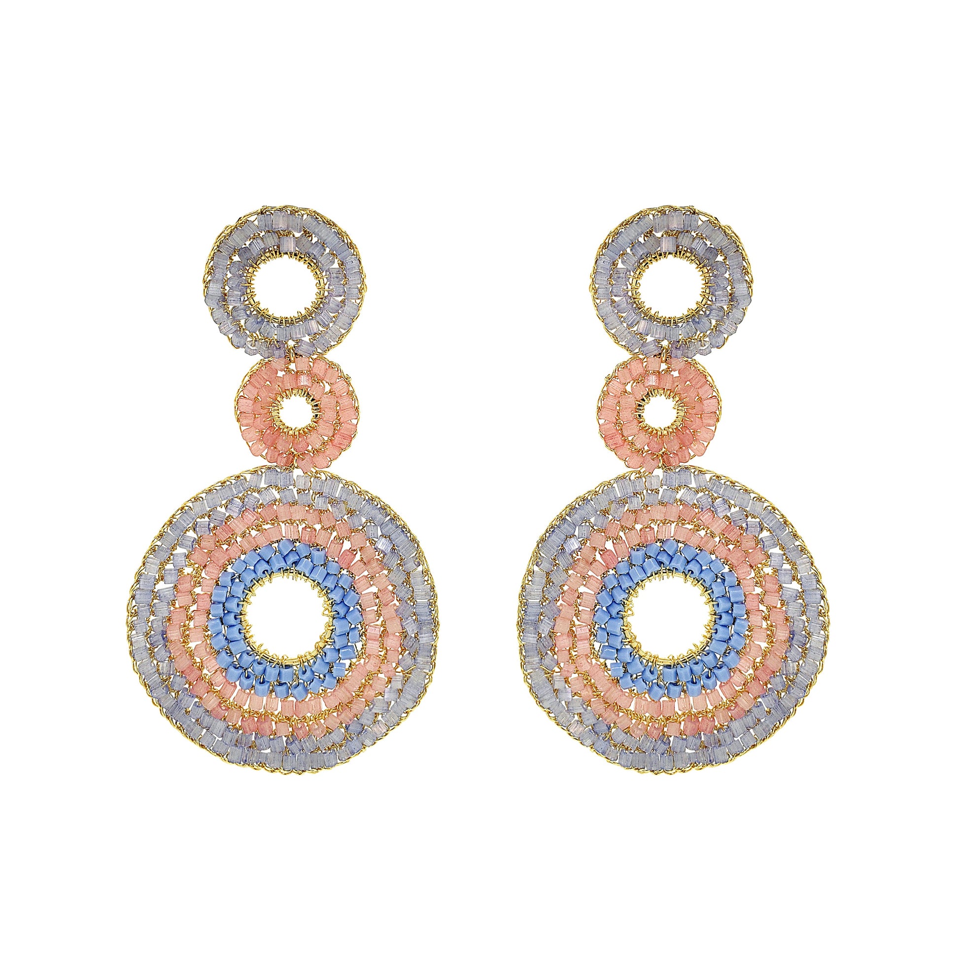 Pair of earrings with circular design on a white background