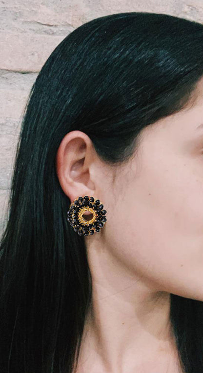 Handmade in Brazil, these hand crocheted post earrings are lightweight, hypoallergenic, nickel free, and crafted with shiny 18 karat plated wire. 4297-001-014