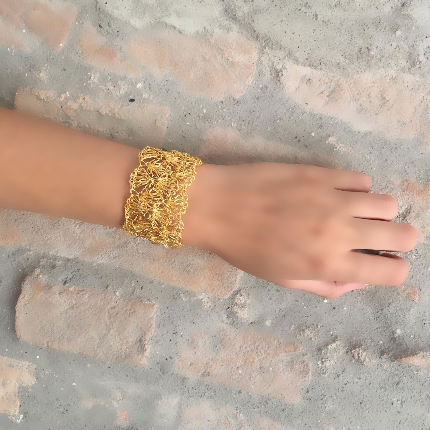 Hand-crocheted 18k gold filled shell cuff bracelet handmade in Brazil, lightweight hypoallergenic nickel-free artisan jewelry with magnetic clasp.