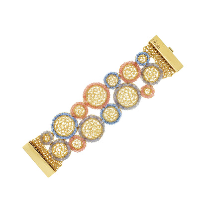 Multicolored circular brooches on a white background