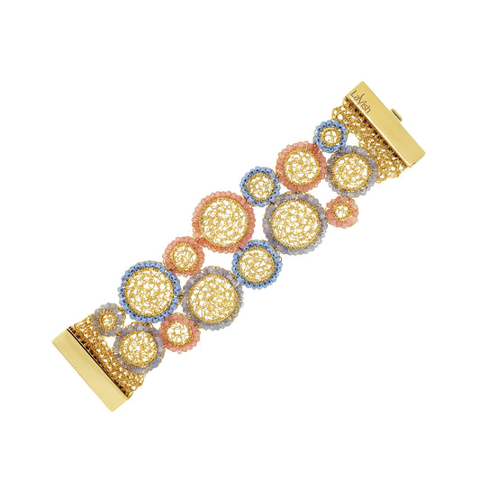 Multicolored circular brooches on a white background