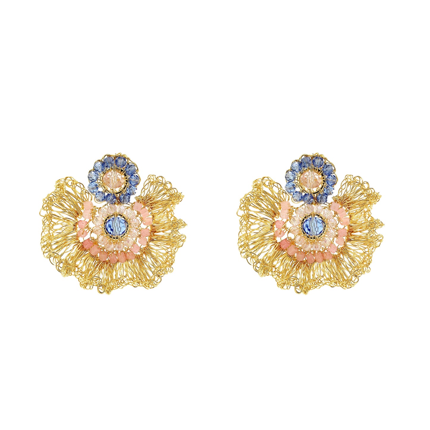 Pair of gold floral earrings with colorful stones on a white background