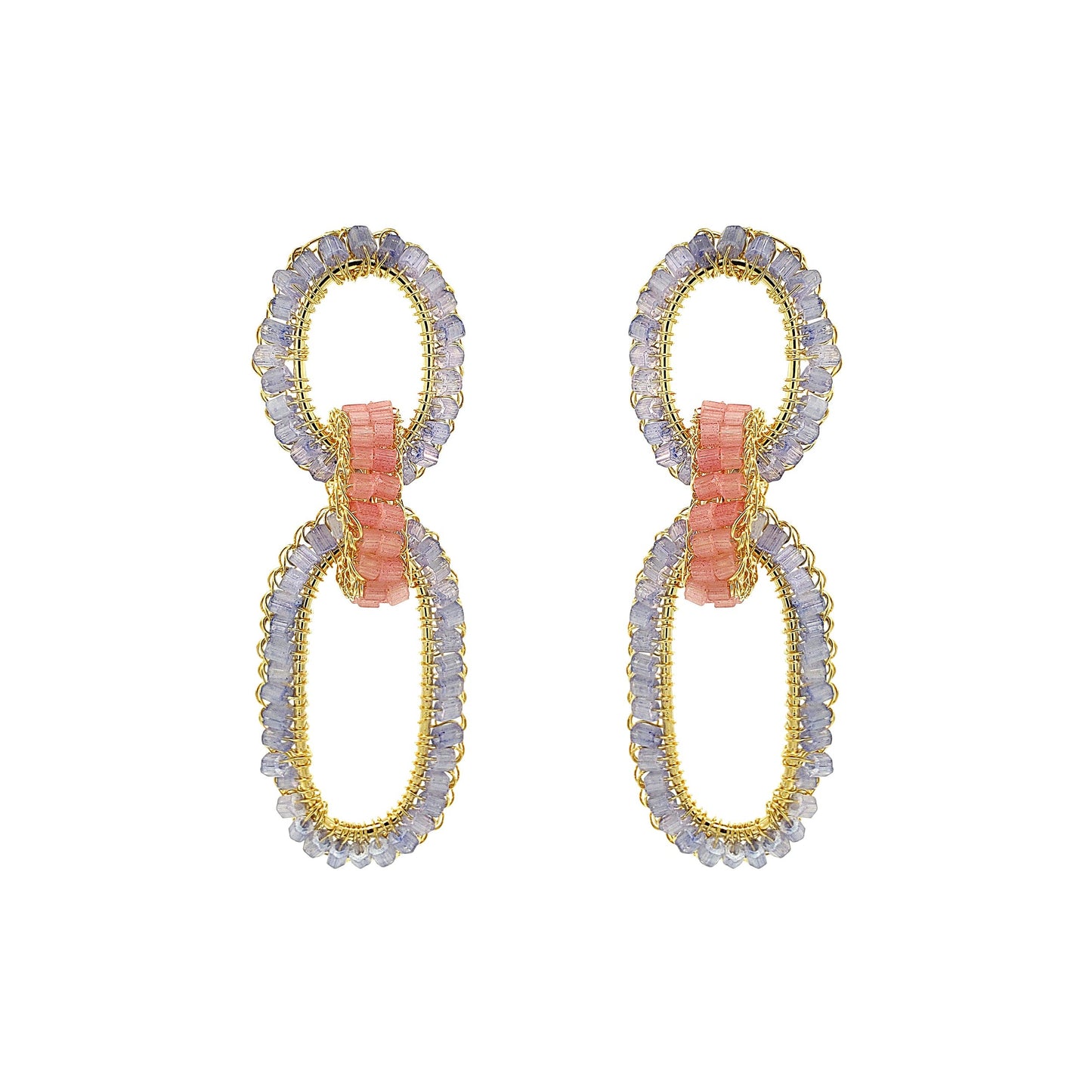 Pair of earrings with gold and silver loops on a white background