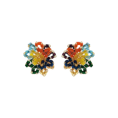 A pair of hand-crocheted multicolored earrings with gold accents, made from 18 Karat Gold Filled Wire.