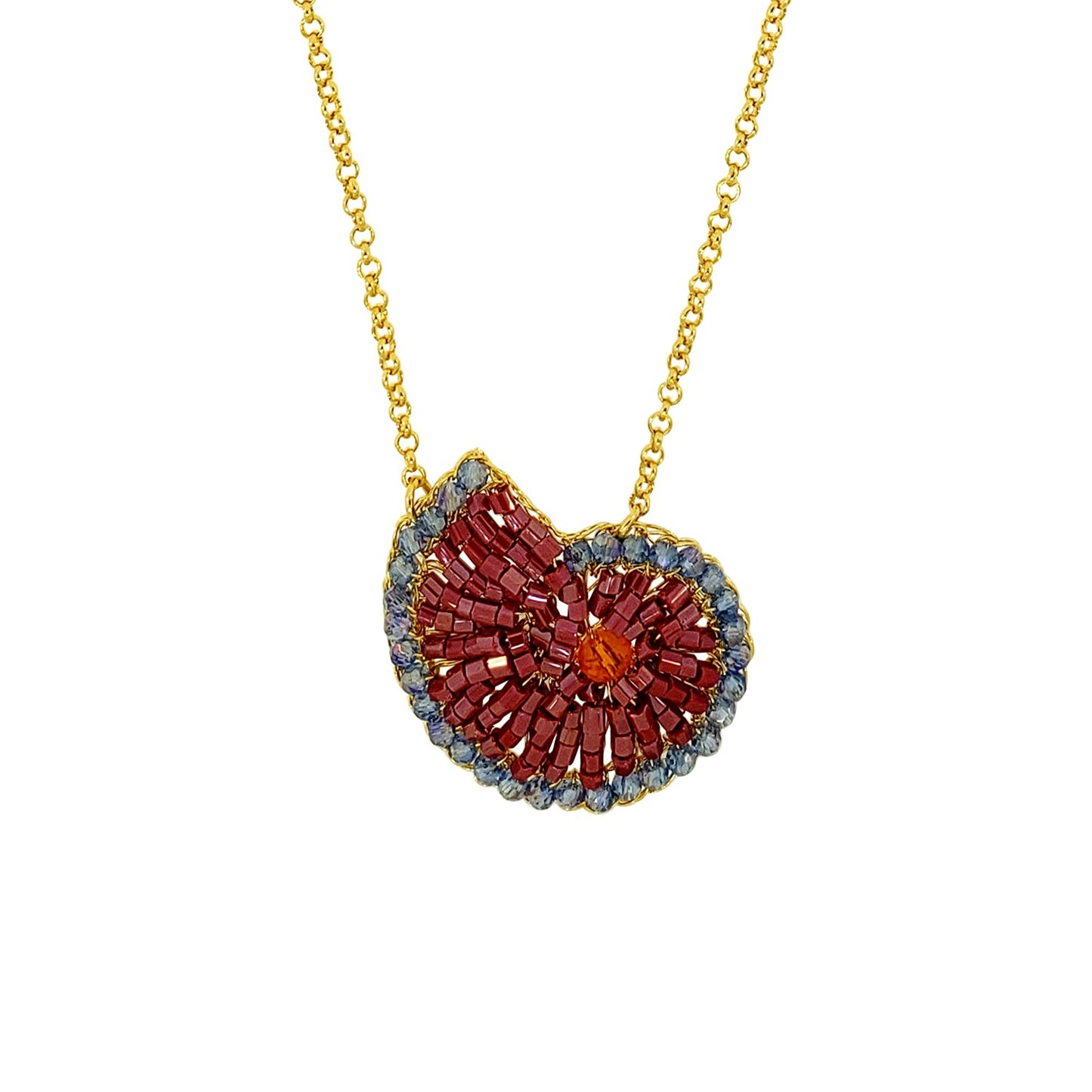 Gold necklace with a heart-shaped pendant on a white background