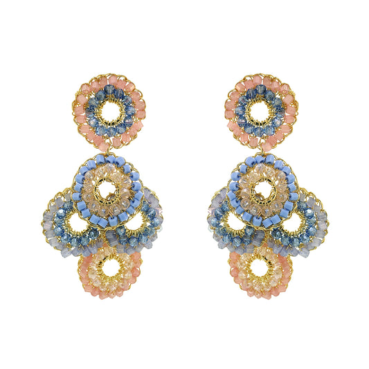 Pair of multicolored beaded earrings on a white background