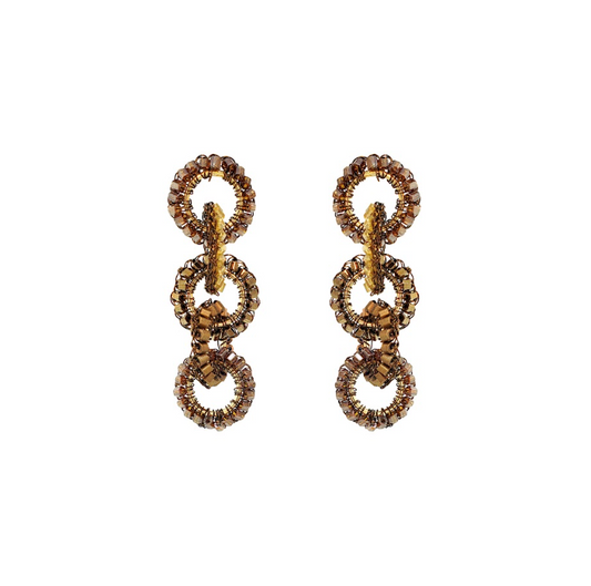 A pair of gold-toned drop earrings featuring three stacked textured circular links, shown on a plain white background.