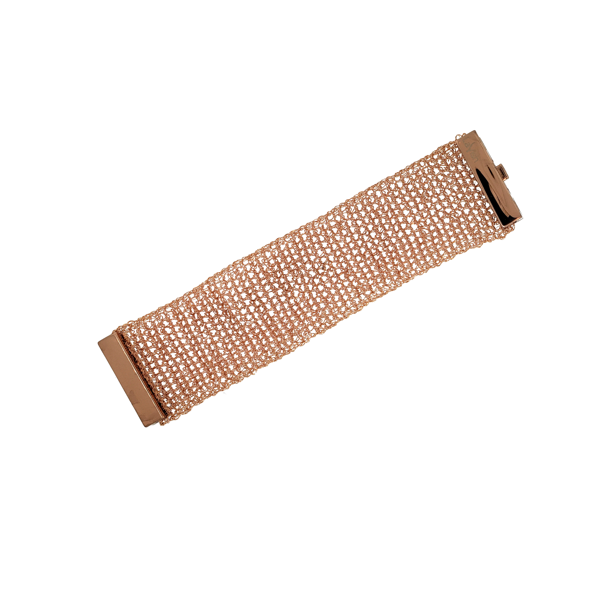 A hand-crocheted rose gold mesh bracelet with a magnetic clasp. Hand-crocheted rose gold cuff bracelet handmade in Brazil with 18 karat rose gold filled wire, intricate crochet texture, and matching magnetic closures.