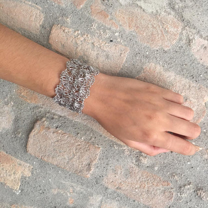 Hand-crocheted Palladium filled shell cuff bracelet handmade in Brazil, lightweight hypoallergenic nickel-free artisan jewelry with magnetic clasp.