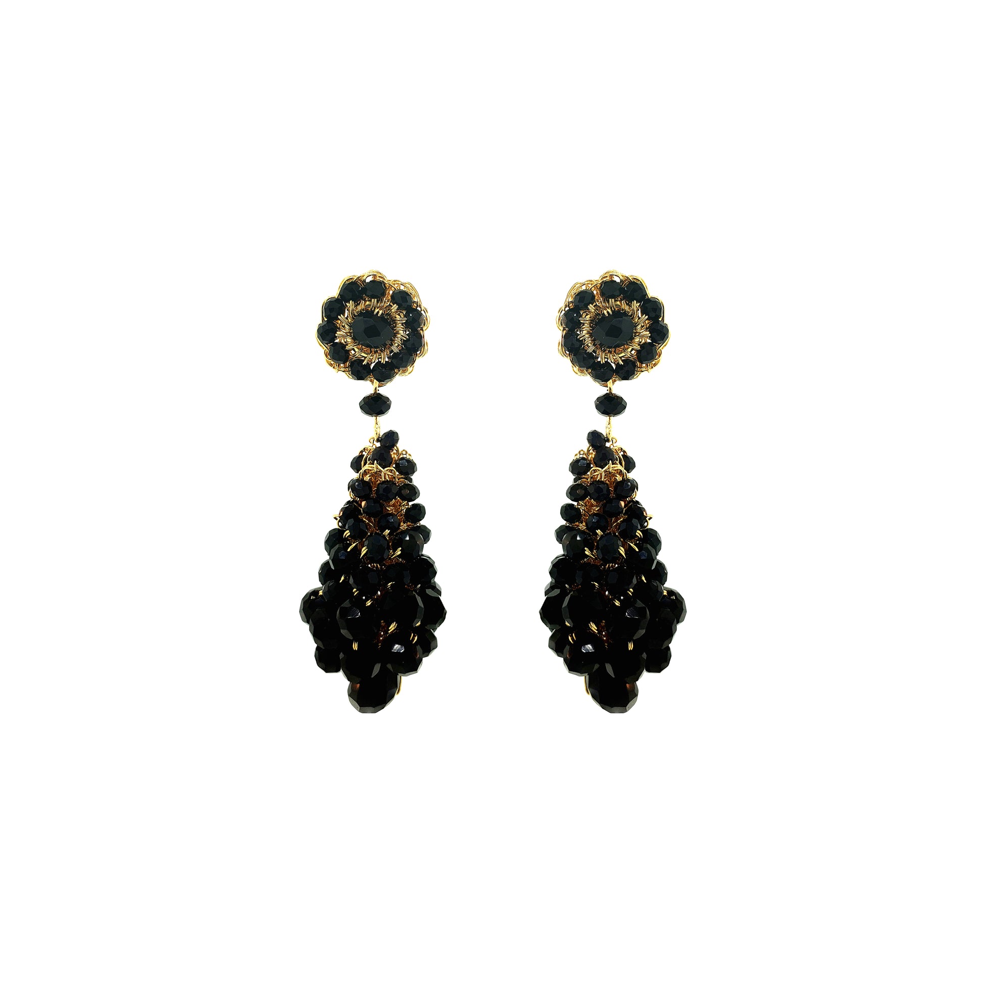Pair of black and gold earrings on a white background. Hand-crocheted statement earrings made in Brazil with 18 karat gold filled wire and sparkling bead accents.