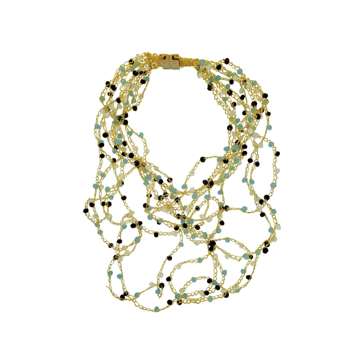 A blue and brown multi-string crocheted necklace laid out on a plain surface. Layered multi-string hand-crocheted necklace handmade in Brazil with 18 karat gold filled wire, blue, ivory, and brown bead accents, and a secure magnetic clasp.