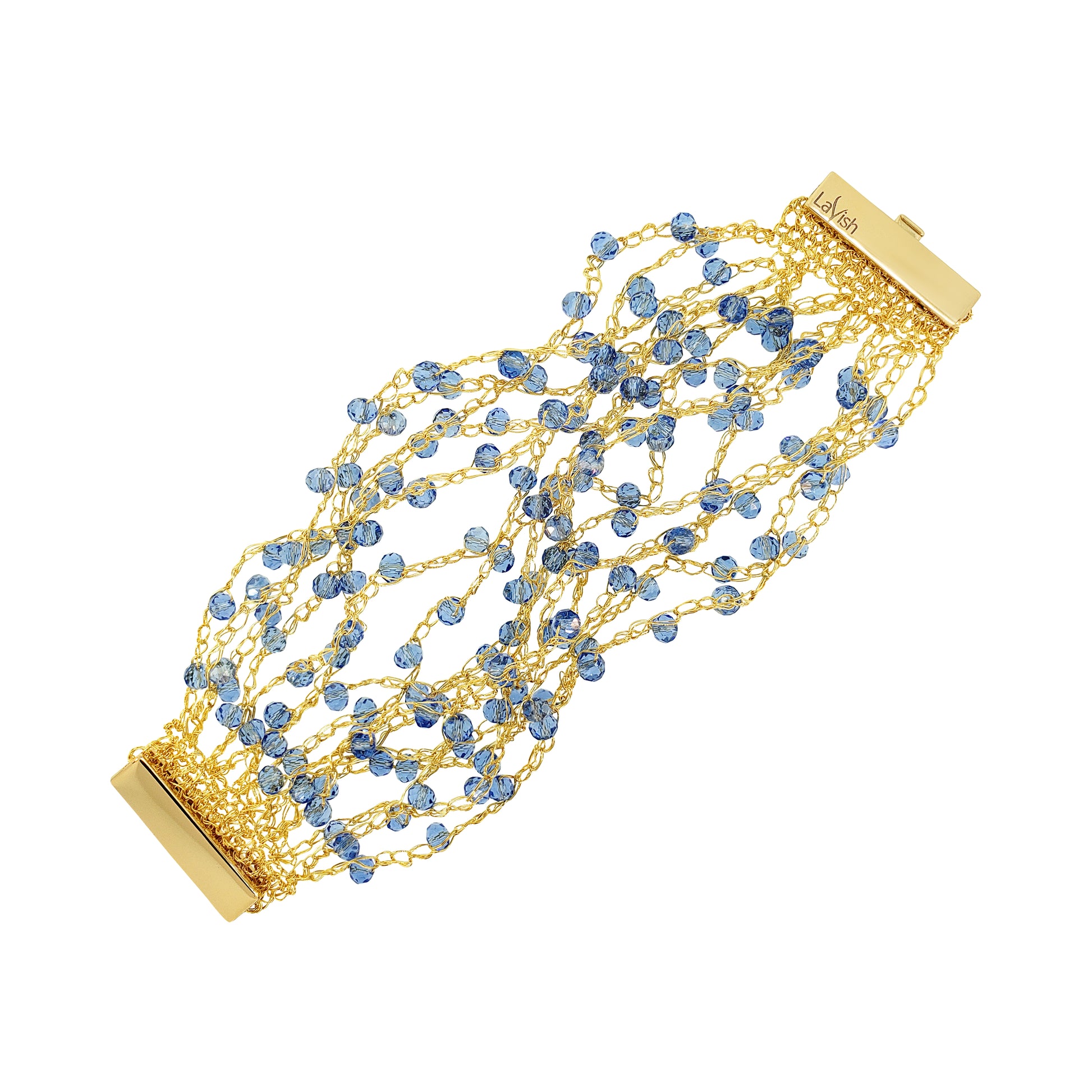 Gold bracelet with blue beads on a white background. Hand-crocheted gold cuff bracelet handmade in Brazil with 18 karat gold filled wire, sparkling blue crystal accents, and magnetic clasp.