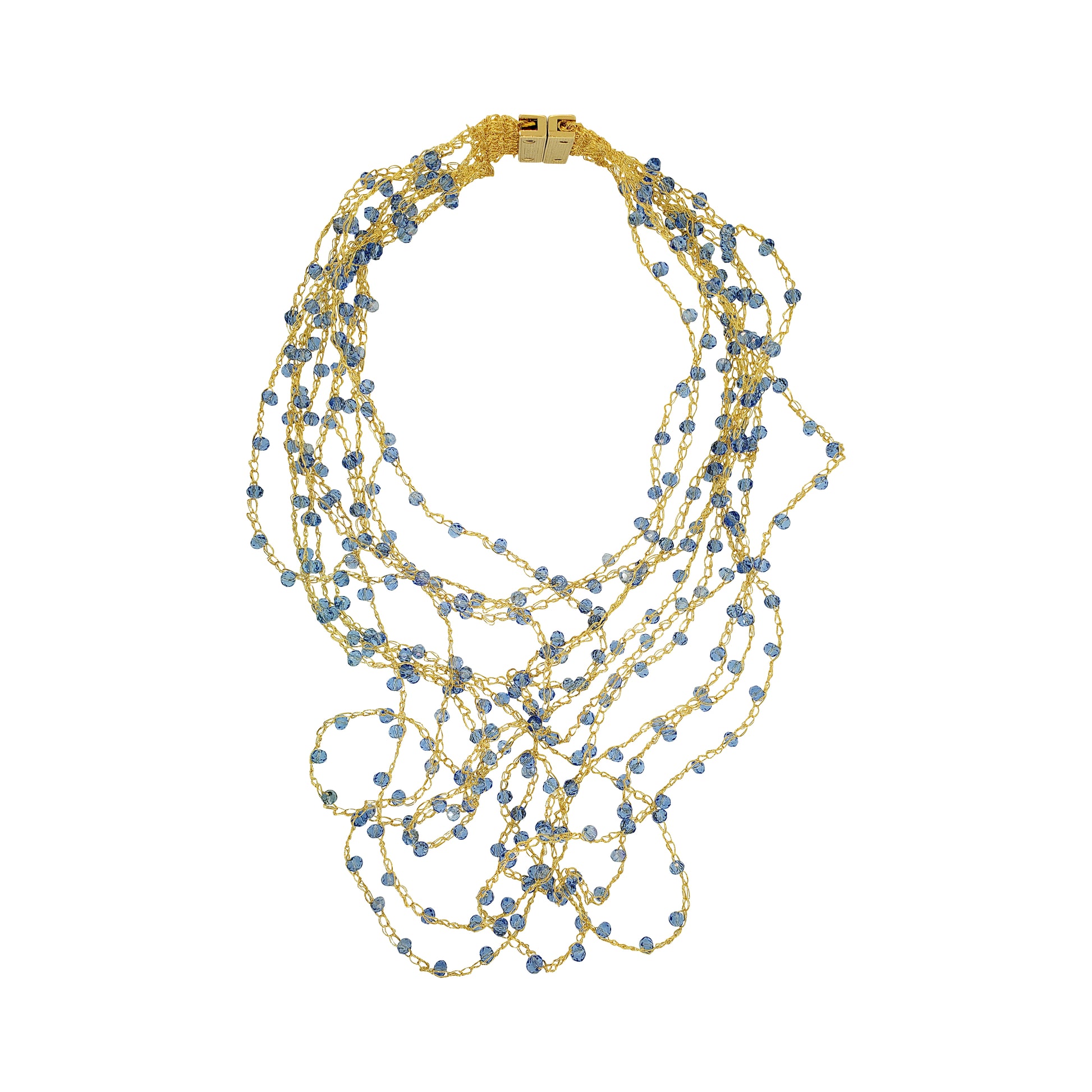 Multistrand necklace with blue beads and gold accents on a white background. Layered multi-string hand-crocheted necklace handmade in Brazil with 18 karat gold filled wire and delicate blue crystal accents.