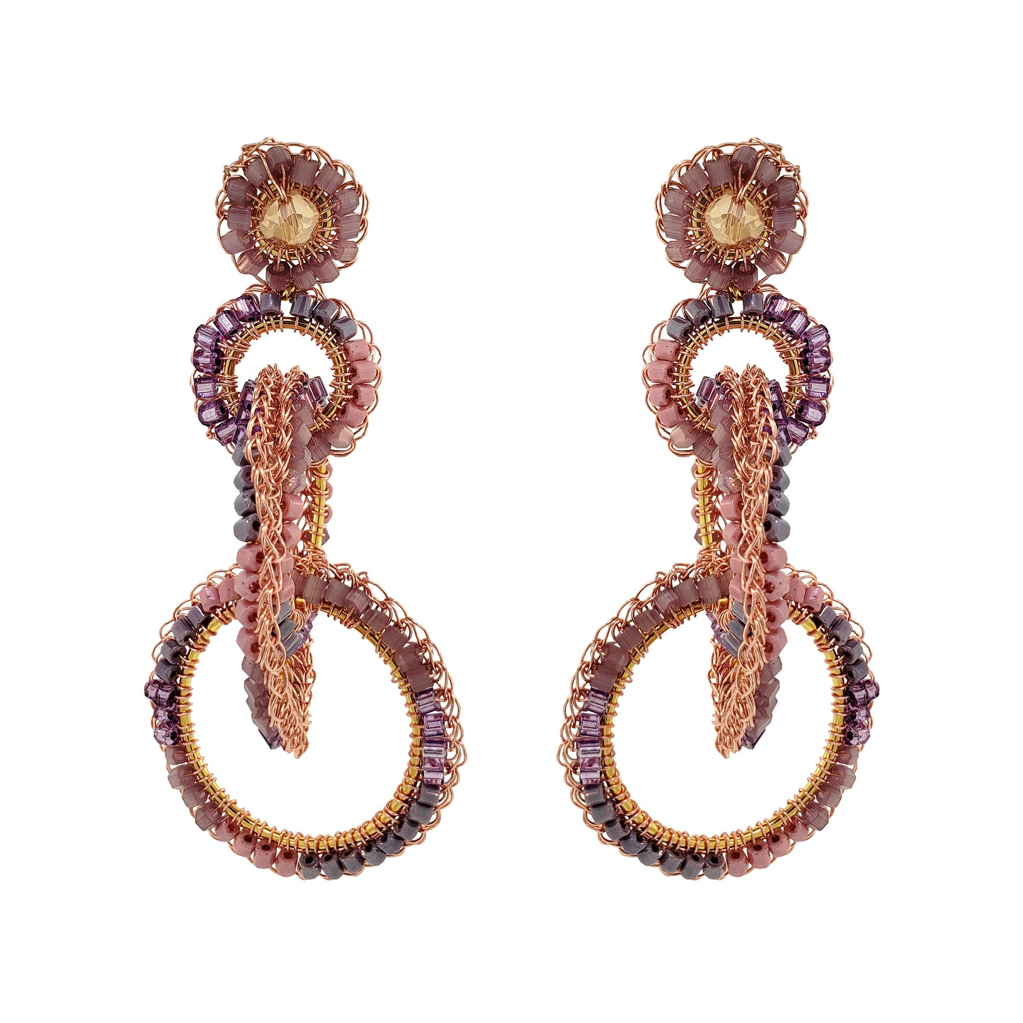 A pair of hand-crocheted earrings with 18 karat rose gold filled wire and multicolored beads and crystals. Interlocked link hand-crocheted earrings handmade in Brazil with 18 karat rose gold filled wire, blush, mauve, and lavender bead accents, sparkling crystals, and layered circular links.