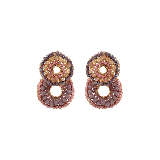 A pair of hand-crocheted round earrings with multicolored crystals and enameled copper wire details.
