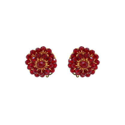 Pair of red beaded earrings with gold accents on a white background. Shop Burgundy & Gold Ava Post Earrings, hand-crocheted in Brazil with 18K gold filled wire and sparkling burgundy crystals. Lightweight and elegant.