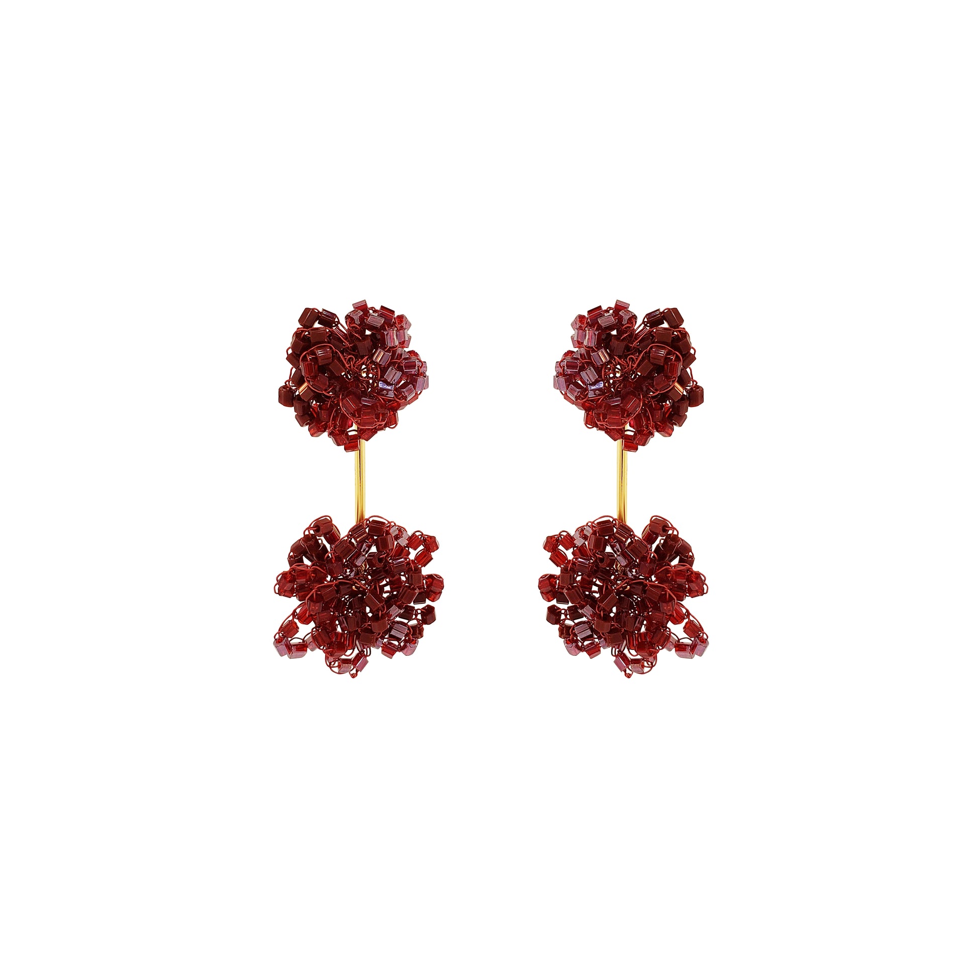 A pair of dangling earrings with textured deep red floral clusters suspended from thin gold posts, shown against a plain white background. Shop Burgundy Mix Agatha Earrings, featuring textured hand-crocheted clusters connected by a sleek gold bar. Lightweight and handmade in Brazil.