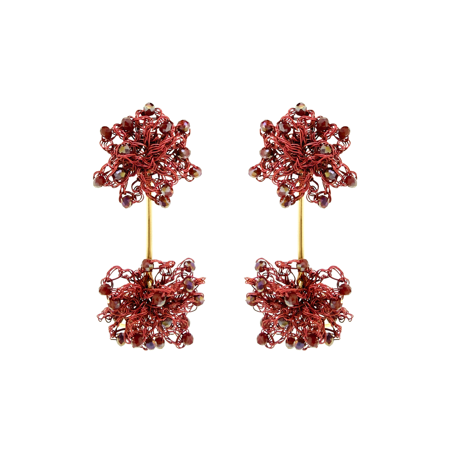 A pair of handmade dangle earrings featuring intricate red wire floral clusters with small dark beads and gold-tone metal posts, shown against a plain white background. Shop Burgundy Mix Agatha Sprinkle Earrings, featuring hand-crocheted clusters, sparkling beads and a sleek gold bar. Lightweight and handmade in Brazil.