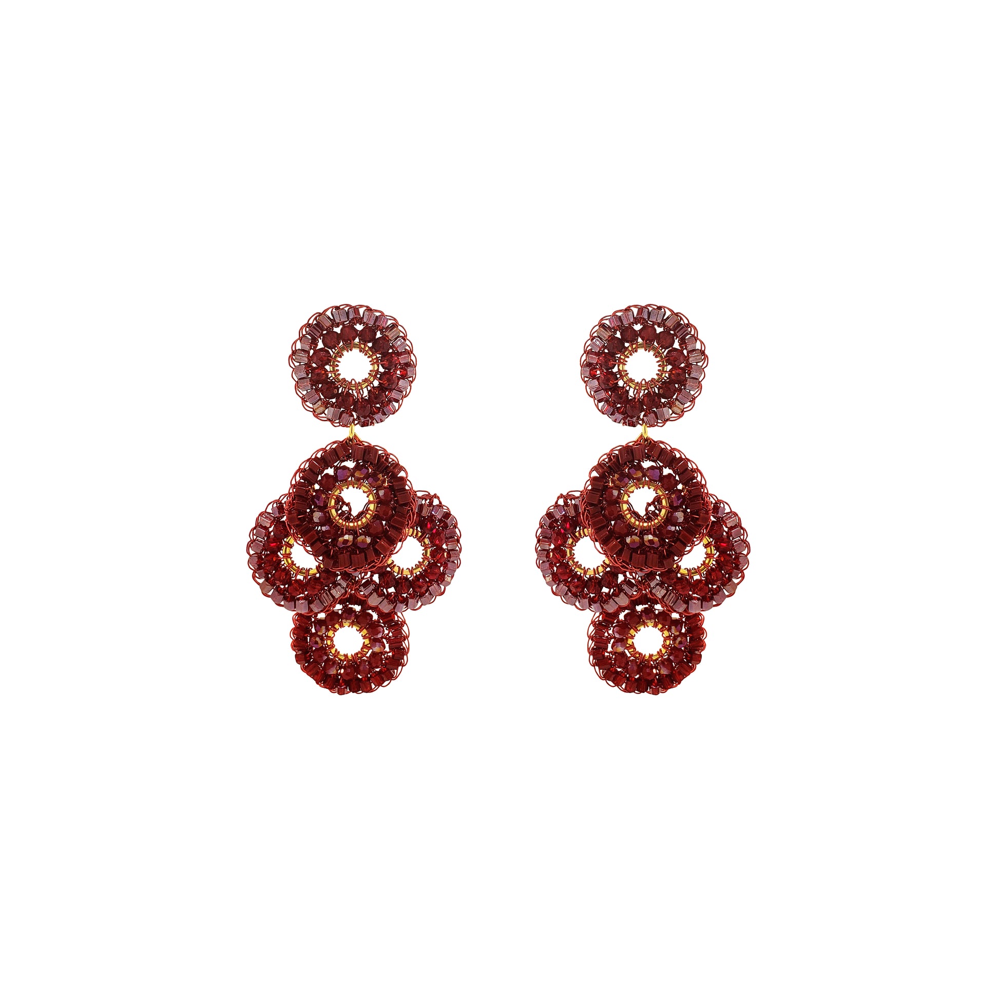 A pair of drop earrings made of multiple stacked circular crystal clusters in a deep burgundy-red hue, set against a plain white background. Shop Burgundy Mix Coco Earrings, handcrafted in Brazil with 18K gold filled and enameled wire. Lightweight crystal statement earrings in rich burgundy tones.