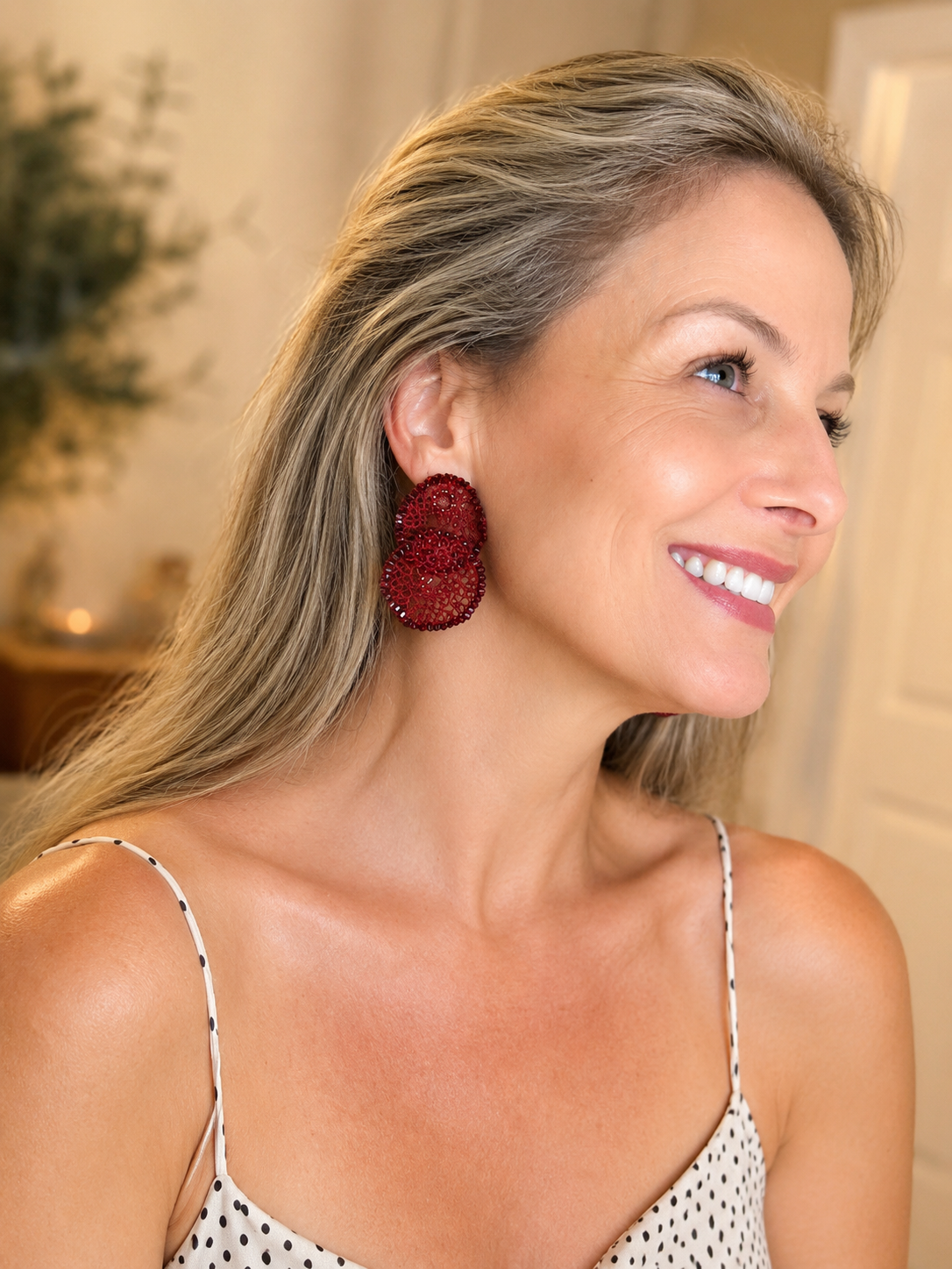 Hand-crocheted red statement earrings with layered circular design, sparkling bead accents, and enameled wire, handmade in Brazil. Hand-Crocheted Red Statement Earrings. Lightweight Artisan Earrings Made in Brazil
