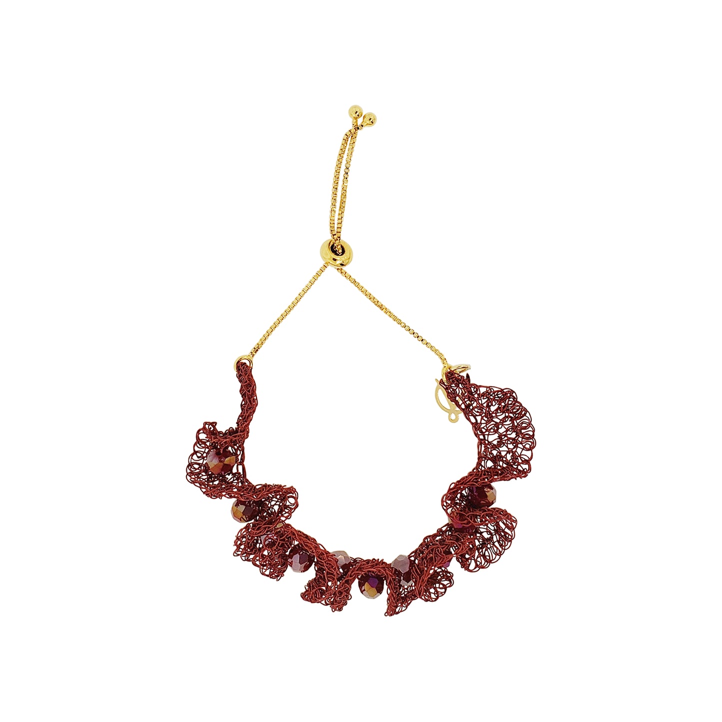 A gold chain necklace with a wide, ruffled burgundy-red mesh collar featuring small brown beads, displayed on a solid white background. Burgundy Mix Nalu handmade crochet bracelet featuring rich burgundy tones woven with 18K gold-filled and enameled wire in an adjustable design.