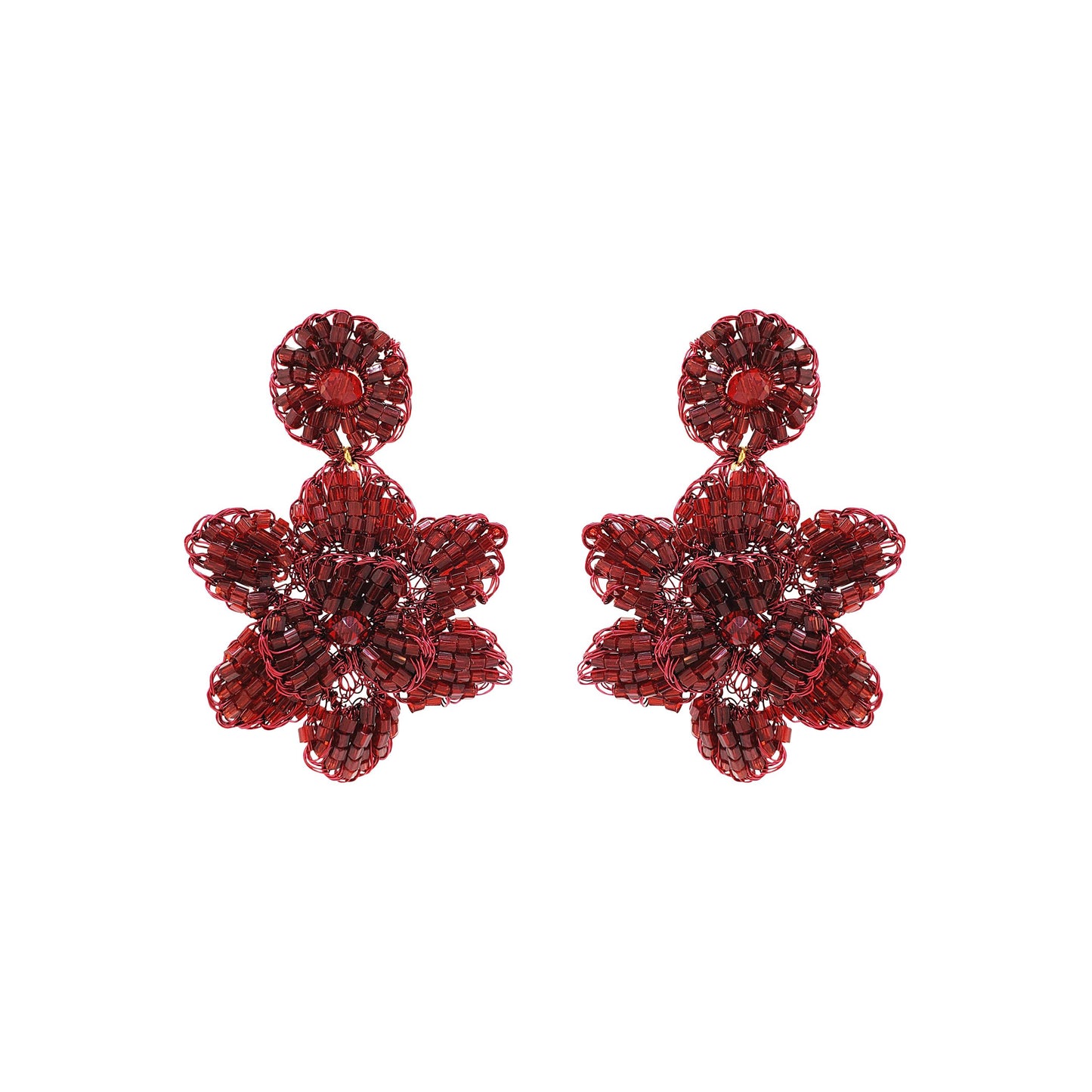 A pair of cherry red, hand-crocheted floral earrings made with enameled copper wire, displayed against a white background. Mini floral hand-crocheted dangle earrings handmade in Brazil with shiny enameled wire and deep cherry red bead accents.
