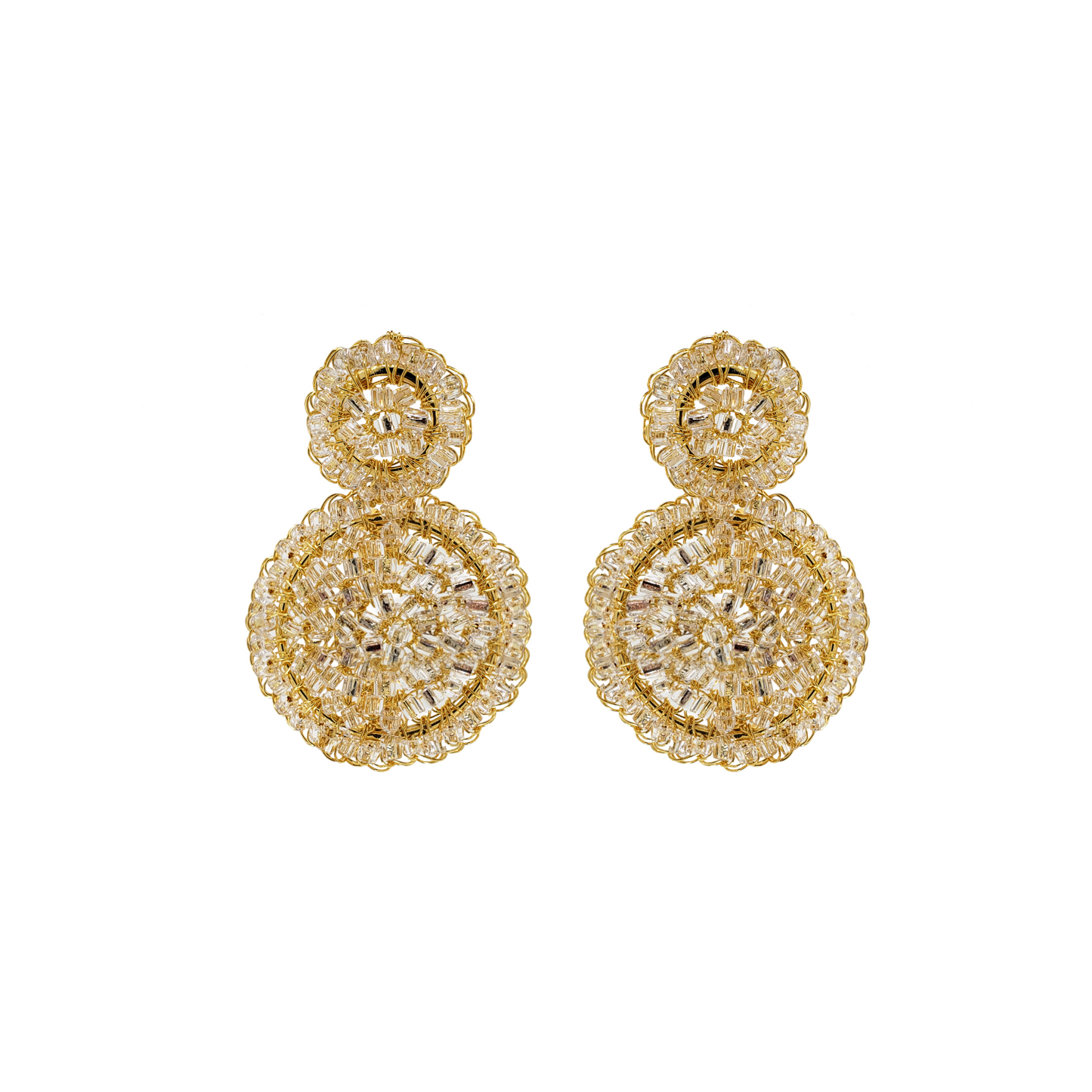 A pair of hand-crocheted round earrings with gold and clear detailing, made from 18 karat gold filled wire. Handmade in Brazil, these mini mandala earrings feature 18 karat gold filled wire, clear crystals, lightweight comfort, and hypoallergenic nickel free materials.