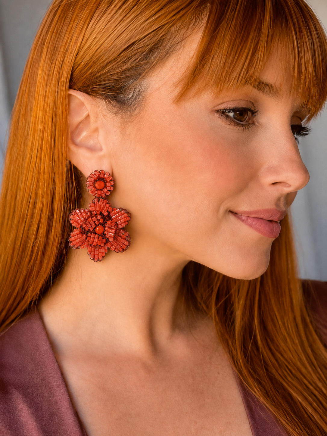 mini floral earrings, hand-crocheted earrings, coral orange earrings, orange bead earrings, coral bead earrings, enameled wire earrings, handmade Brazilian earrings, artisan earrings, lightweight dangle earrings, hypoallergenic earrings, nickel free earrings, floral dangle earrings, resort earrings, vacation earrings, summer earrings, handmade jewelry
