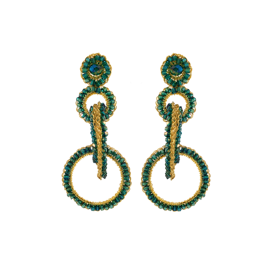 A pair of emerald green and gold hand-crocheted earrings with sparkling crystals. Interlocked link hand-crocheted earrings handmade in Brazil with 18 karat gold filled wire, emerald green beads, sparkling crystal accents, and layered circular links.