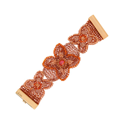 Shop the Flame Mix Orchid Bloom Maxi Bracelet. Handmade in Brazil with intricate copper wire crochet, vibrant floral details, and sparkling crystals.