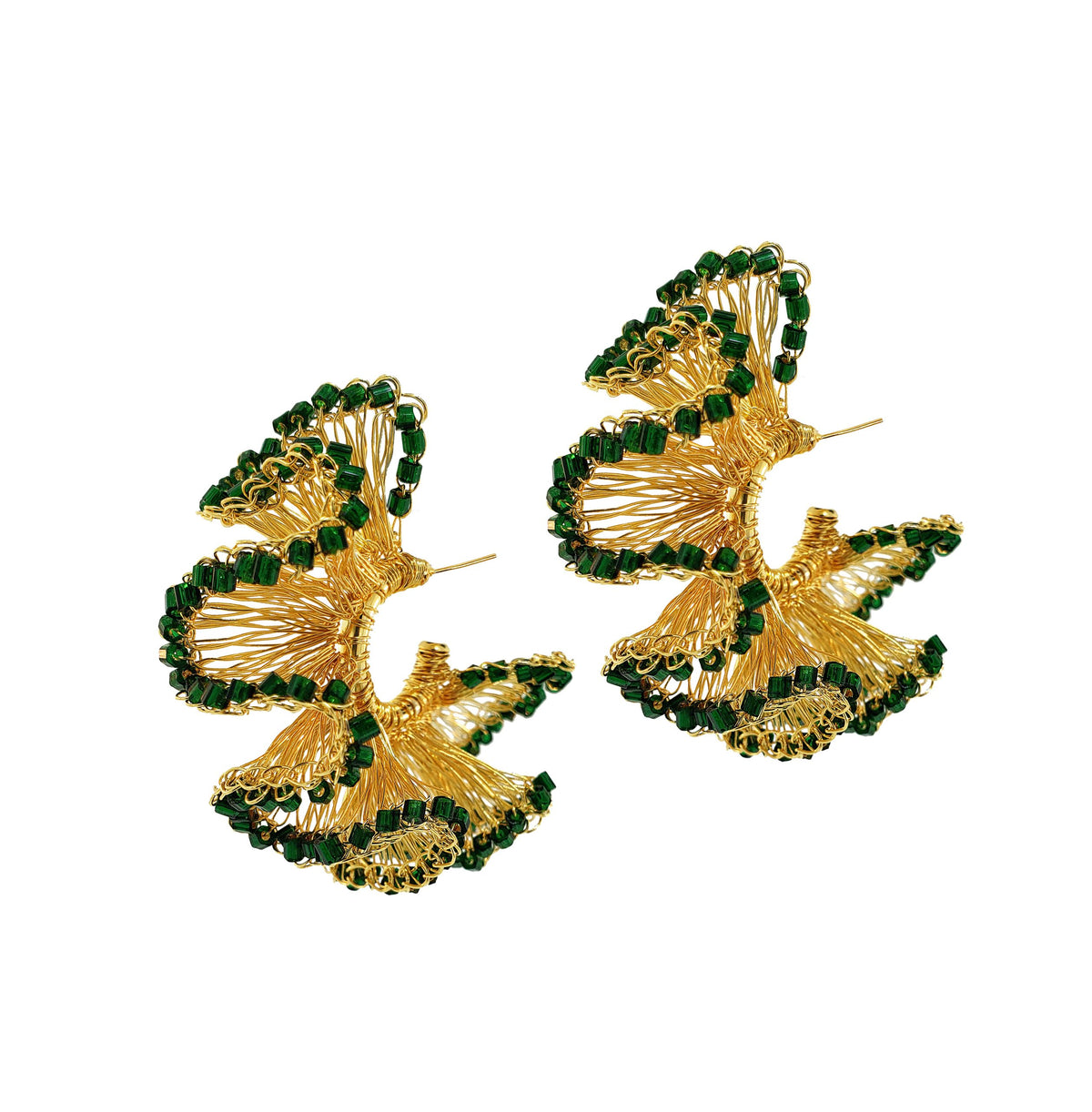 A pair of hand-crocheted hoop earrings with green and gold patterns, made with 18k gold filled wire. Green and Gold Rio Hoop handmade crochet earrings featuring sculptural ruffled 18K gold-filled wire accented with rich dark green crystals.