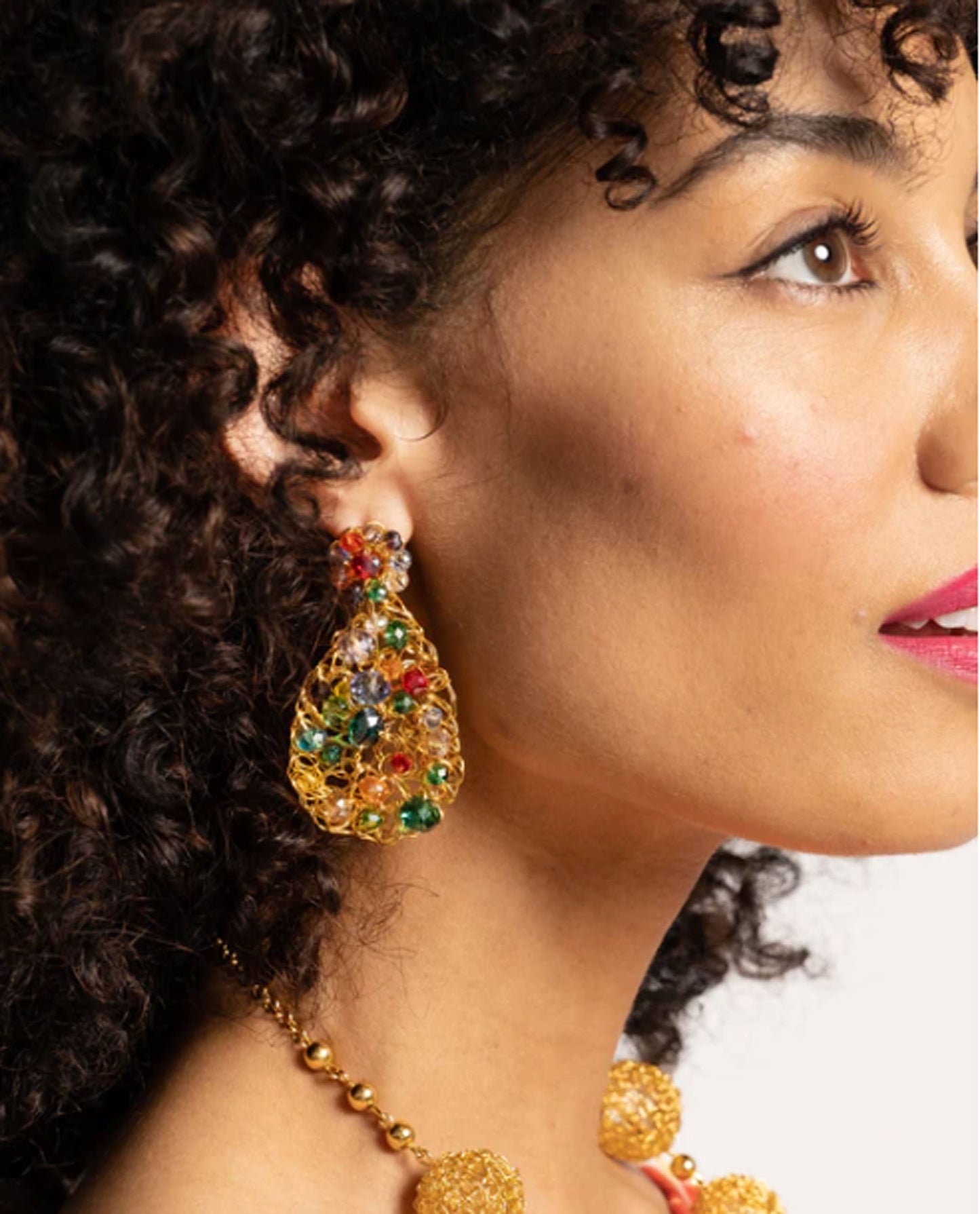 Handmade in Brazil, these teardrop mesh earrings feature 18 karat gold filled wire, multicolor crystals, lightweight comfort, and hypoallergenic materials. FV Frances Valentines