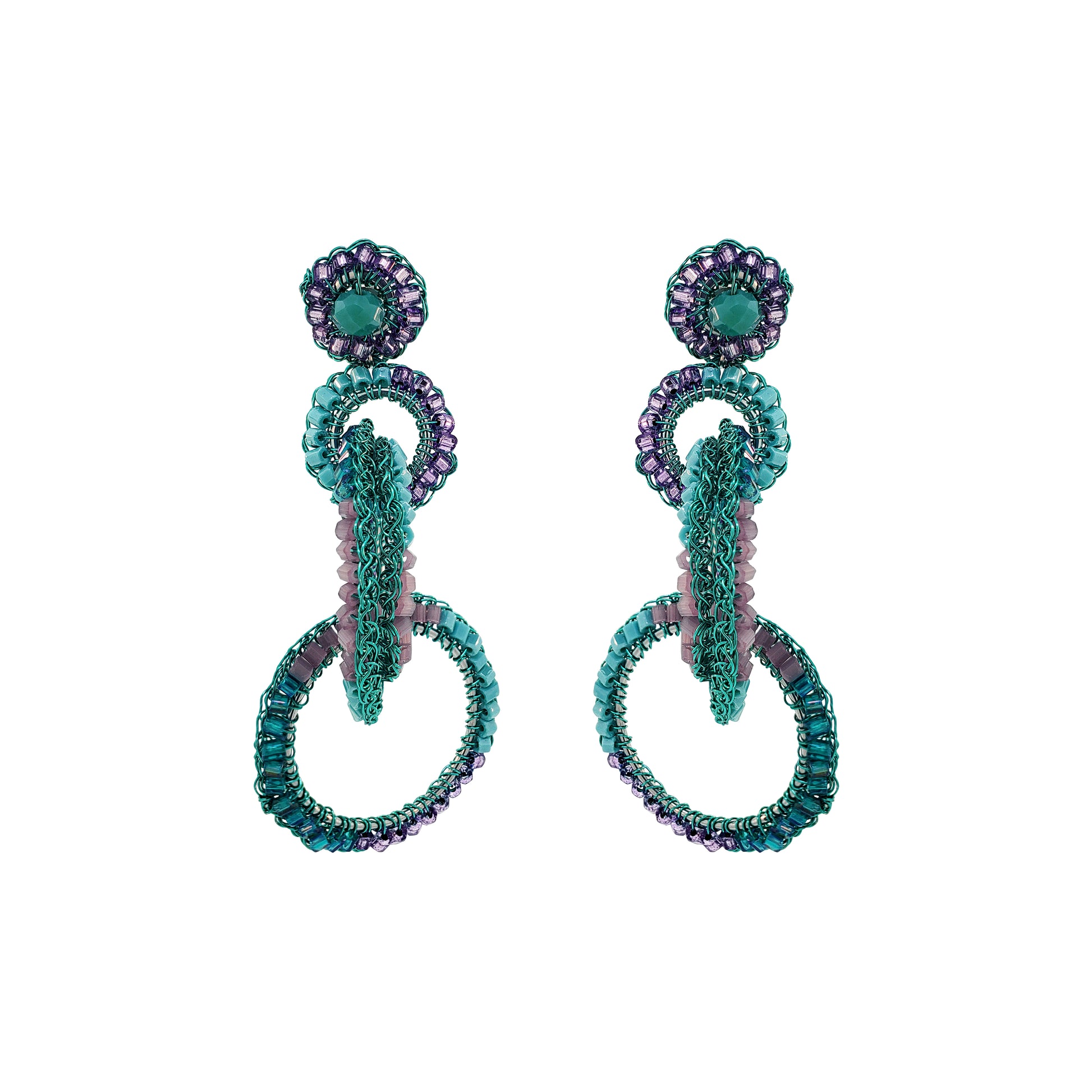 A pair of hand-crocheted earrings with enameled wire and sparkling crystals in turquoise and purple colors. Interlocked link hand-crocheted earrings handmade in Brazil with neon turquoise enameled wire, sparkling crystal accents, and soft lavender and teal details.