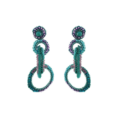 A pair of hand-crocheted earrings with enameled wire and sparkling crystals in turquoise and purple colors. Interlocked link hand-crocheted earrings handmade in Brazil with neon turquoise enameled wire, sparkling crystal accents, and soft lavender and teal details.