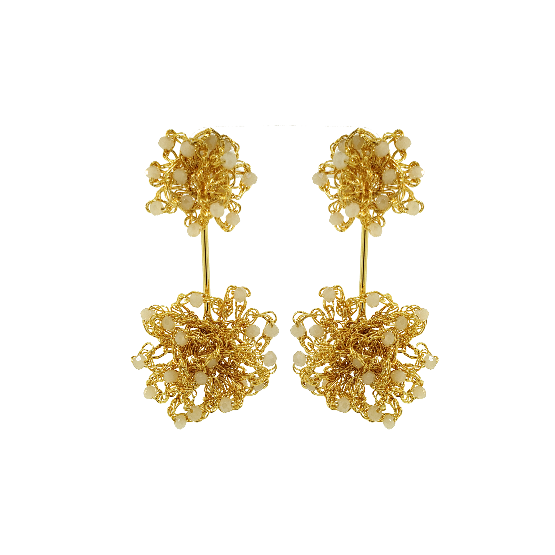 Gold floral earrings on a white background. Hand-crocheted double mandala earrings made with 18 karat gold filled wire and off-white bead accents.