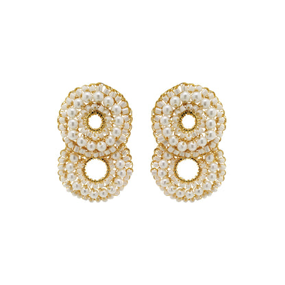 A pair of gold-colored, double-shaped cascade earrings adorned with clear crystals, hand crocheted.