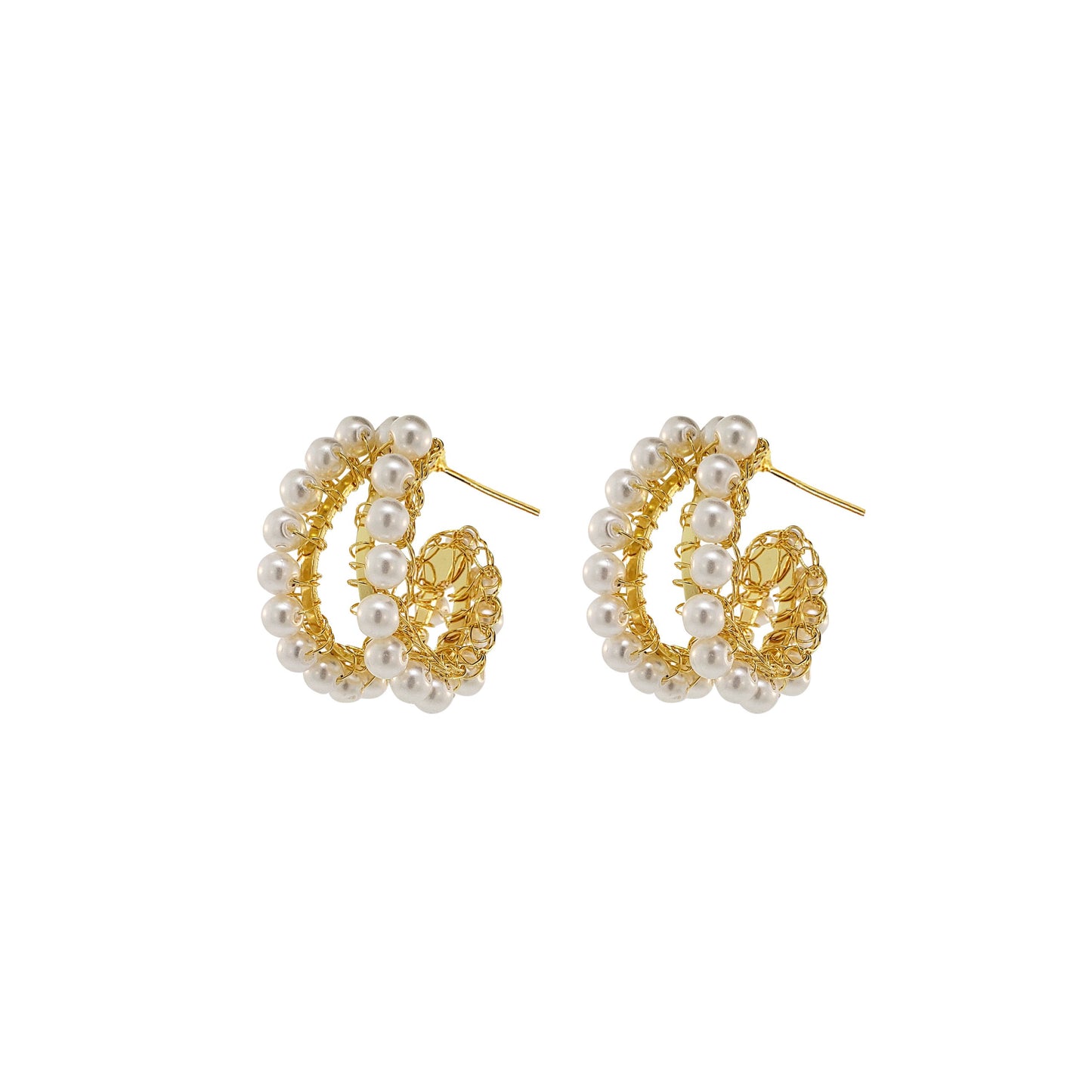 A pair of gold-colored double hand-crocheted hoop earrings with white pearls scattered throughout the design. handmade gold filled hoop earrings, hand crocheted earrings, Brazilian artisan jewelry, lightweight statement earrings, hypoallergenic hoop earrings, nickel free earrings, gold crochet earrings.