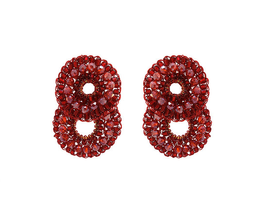 Pair of red beaded earrings shaped like the number 8 on a white background. Red hand-crocheted double-circle cascade earrings with sparkling crystals and glass beads, handmade in Brazil with enameled copper wire.