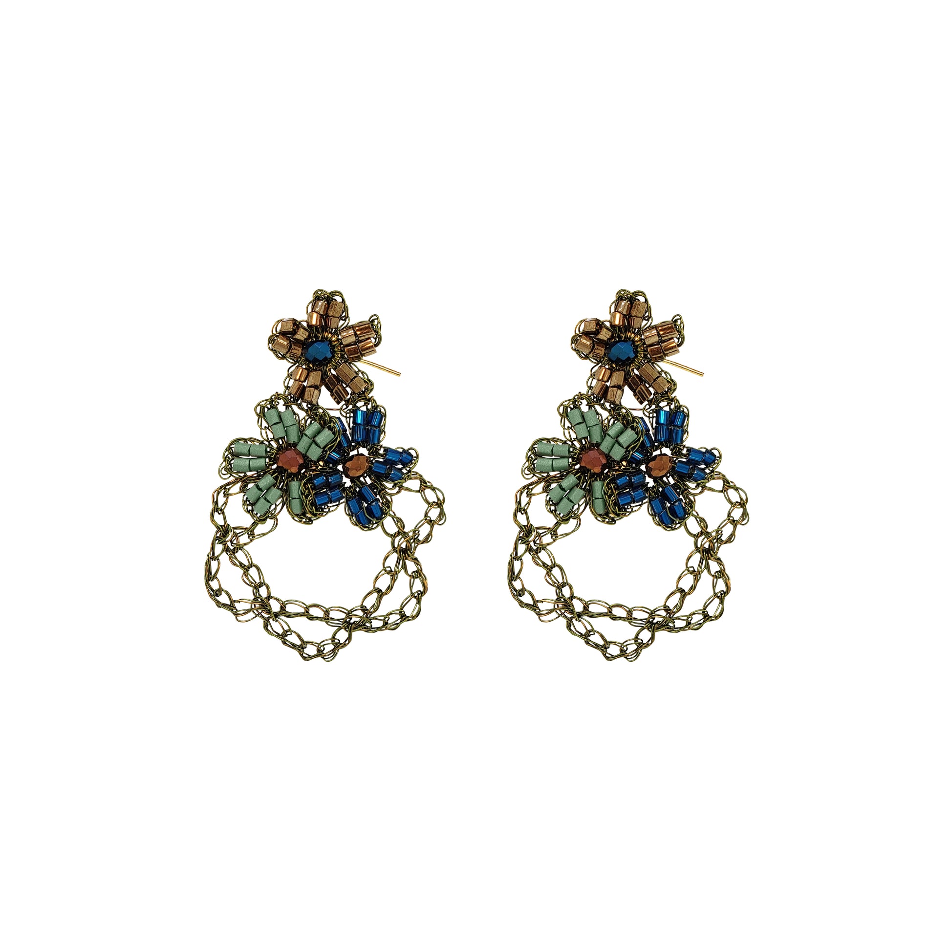 A pair of ornate dangling earrings with antique gold-tone chains and floral clusters of blue, green, and brown rhinestones, shown on a plain white background.  Shop Riviera Mix Aster Trio Earrings, handcrafted in Brazil with floral crochet details, crystals, beads and 18K gold-filled and enameled wire.