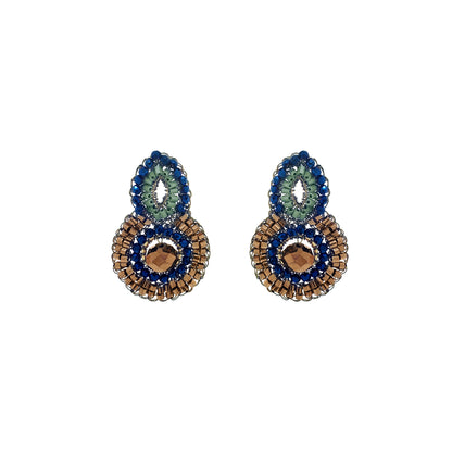 Green quilted cylindrical pouch on a white background. Shop Riviera Mix Billie Trio Earrings, handcrafted in Brazil with 18K gold filled wire, colorful crystals and a faceted center stone. Lightweight and unique.