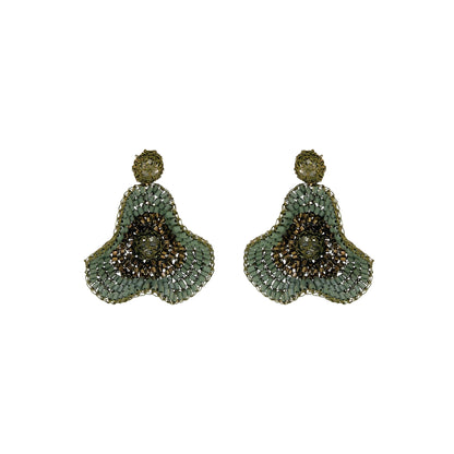 A pair of ornate beaded dangle earrings with a scalloped green and gold design, set against a plain white background. Shop Riviera Mix Buttercup Earrings, handcrafted in Brazil with 18K gold filled and enameled wire. Lightweight floral statement earrings with sage and bronze accents.