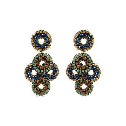 Shop Riviera Mix Coco Earrings, handcrafted in Brazil with 18K gold filled wire and colorful crystal mandalas. Lightweight statement earrings with artisanal detail.
