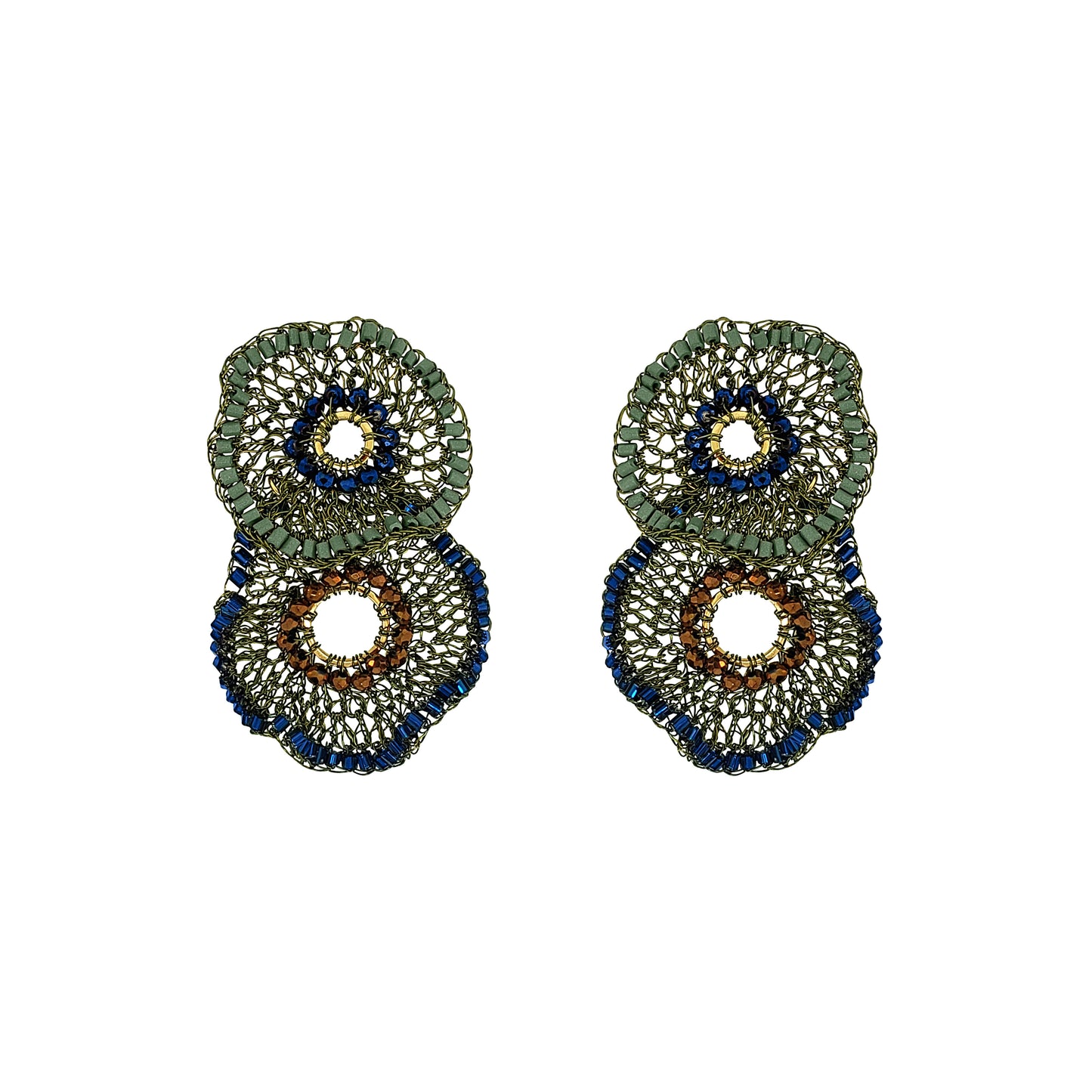 A pair of large, circular beaded earrings with a layered design. The earrings feature textured green, deep blue, and brown beaded rings with openwork centers, set against a plain white background. Shop Riviera Mix Crista Duo Earrings, handcrafted in Brazil with 18K gold filled and enameled wire. Lightweight statement earrings with colorful bead accents.