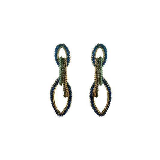 A pair of handmade beaded earrings featuring a double-loop design in navy blue, olive green, and gold, shown against a plain white background. Discover Riviera Mix Demi Earrings, handcrafted in Brazil with 18K gold filled and enameled wire. Lightweight cascading statement earrings with colorful accents.